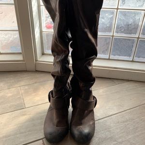 Slouchy brown knee high boots